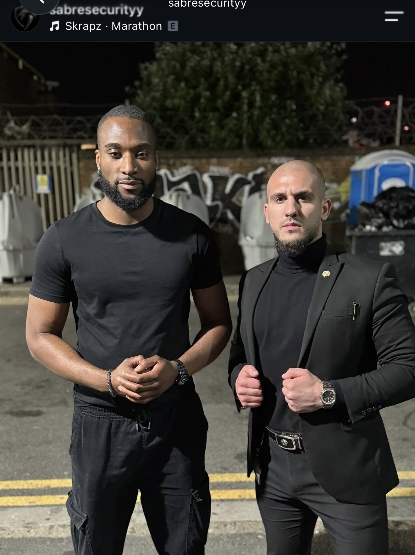 Two SABRE operatives on a London street at night